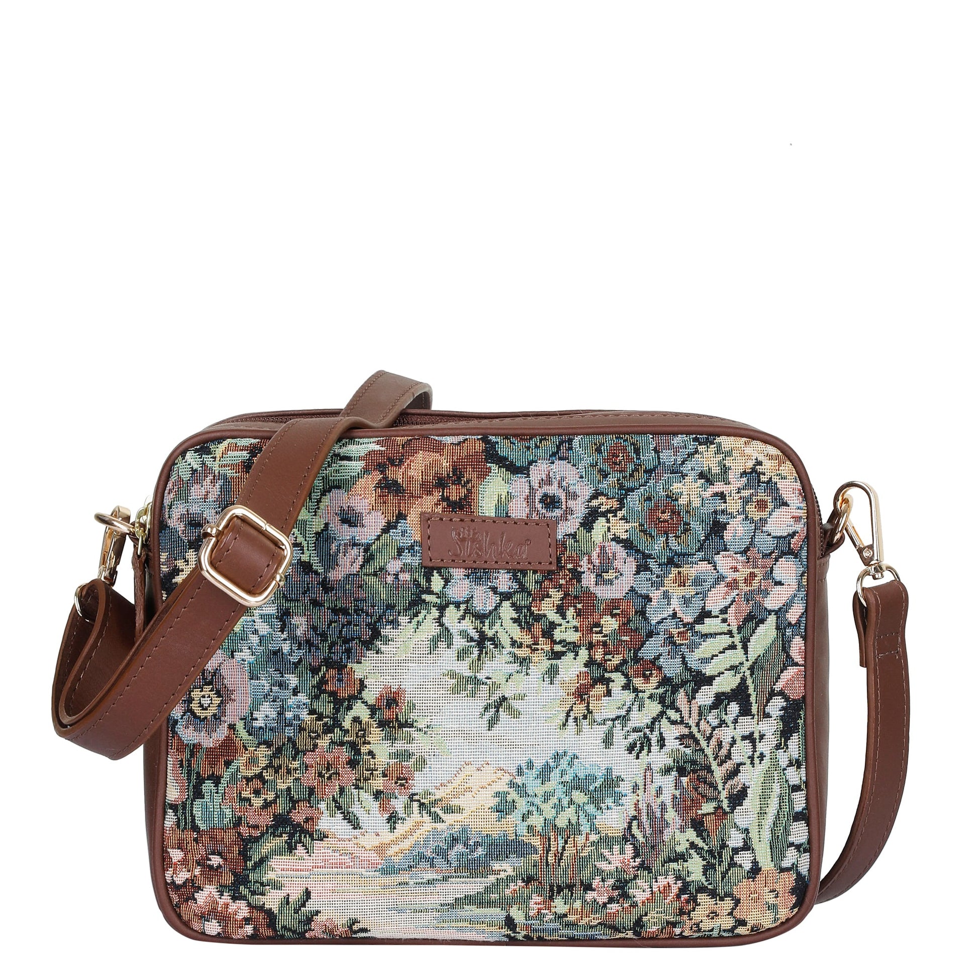 Women's botanical tapestry messenger sling bag with genuine leather trim for travel, shopping, commuting, sightseeing, vacations, errands, and everyday use